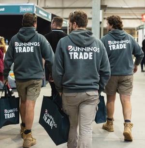 Three Bunnings Trade team members wearing branded hoodies