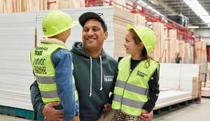 A family wearing Bunnings Trade branded merchandisemerchandise-novelli